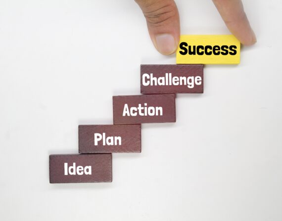 people climb the stairs with the words Idea, Plan, Action, Challenge and Success.